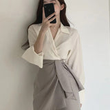 Two Piece Set Female Shirt+High waist A-line Irregular skirt.